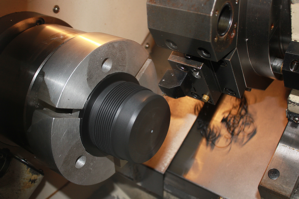 CNC lathe machining a precision Thread Protector